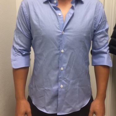 Dress shirt with sleeves half as long as they should be