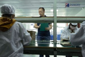 Auditor checking products