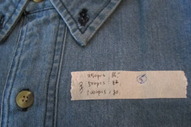 Jean shirt with quality inspection sticker