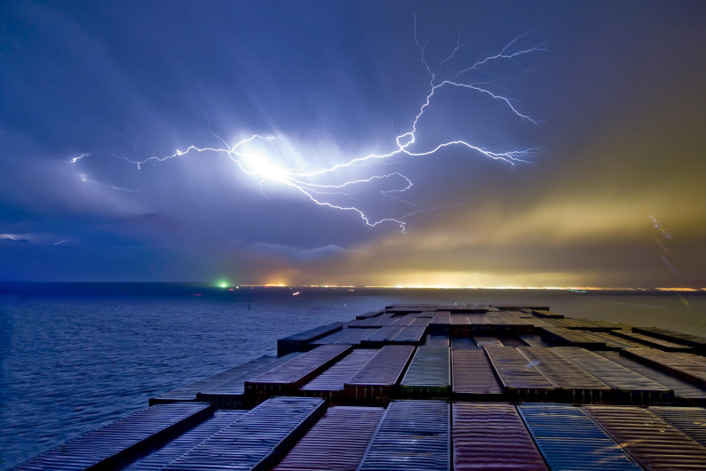 Container ship at sea during storm