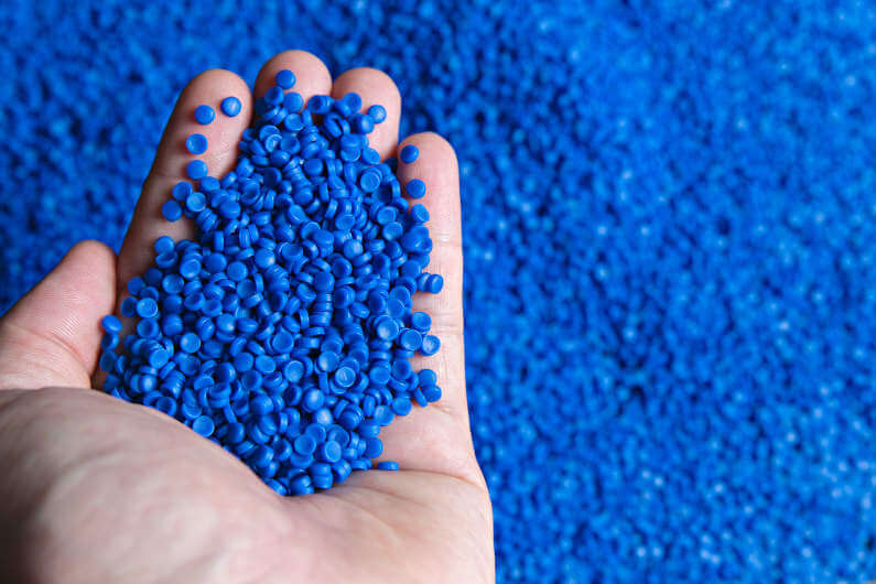 Holding blue plastic resin