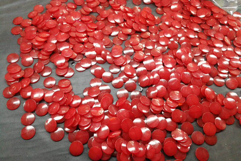 Red resin beads