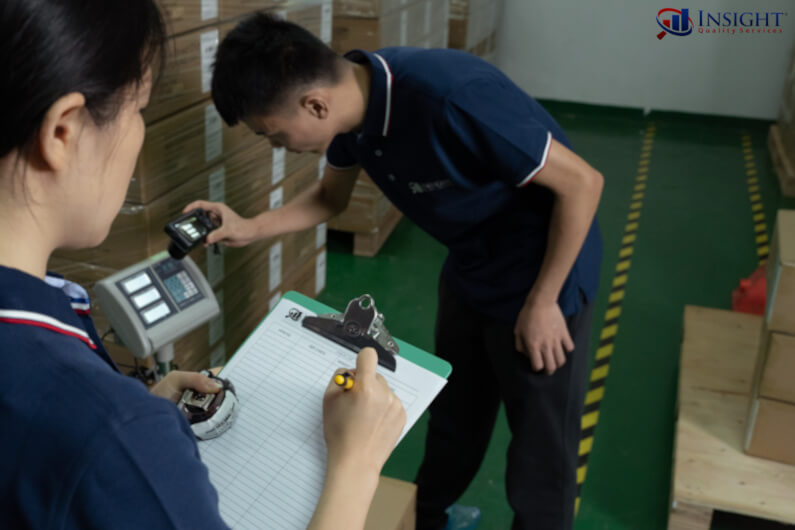 Quality inspectors checking cartons