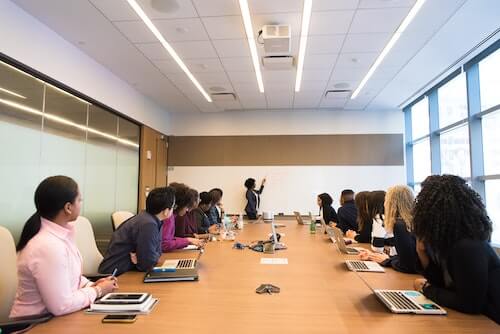 Business meeting with many participants