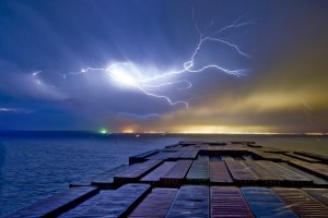 Container ship on the ocean during a storm