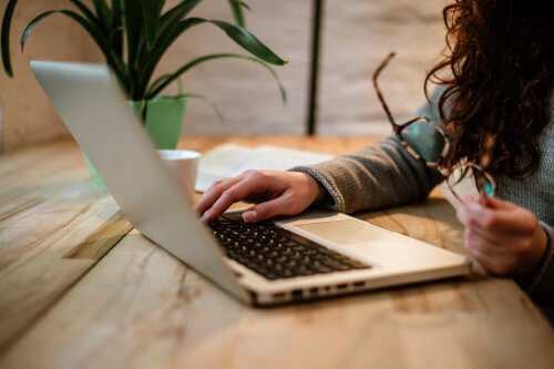 Woman planning on laptop