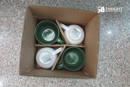Box with ceramic mugs