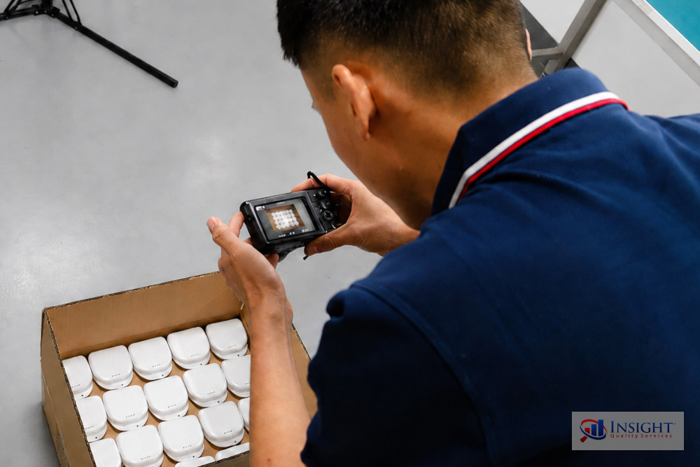 Insight inspector examining the interior of a box