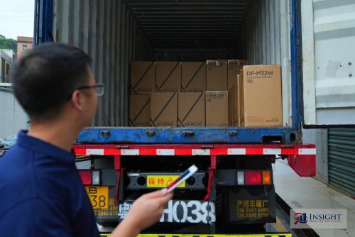 Insight inspector (Ray) examining a container
