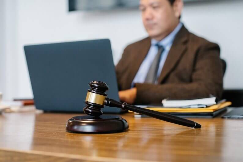 Judge at desk with gavel